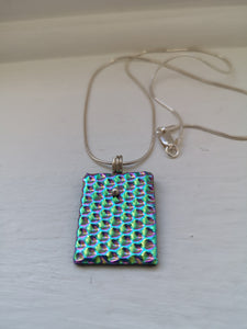 Rainbow dimpled dichroic glass pendant with handmade silver fittings & silver snake chain