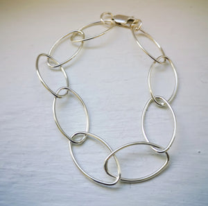 Silver link bracelet.
